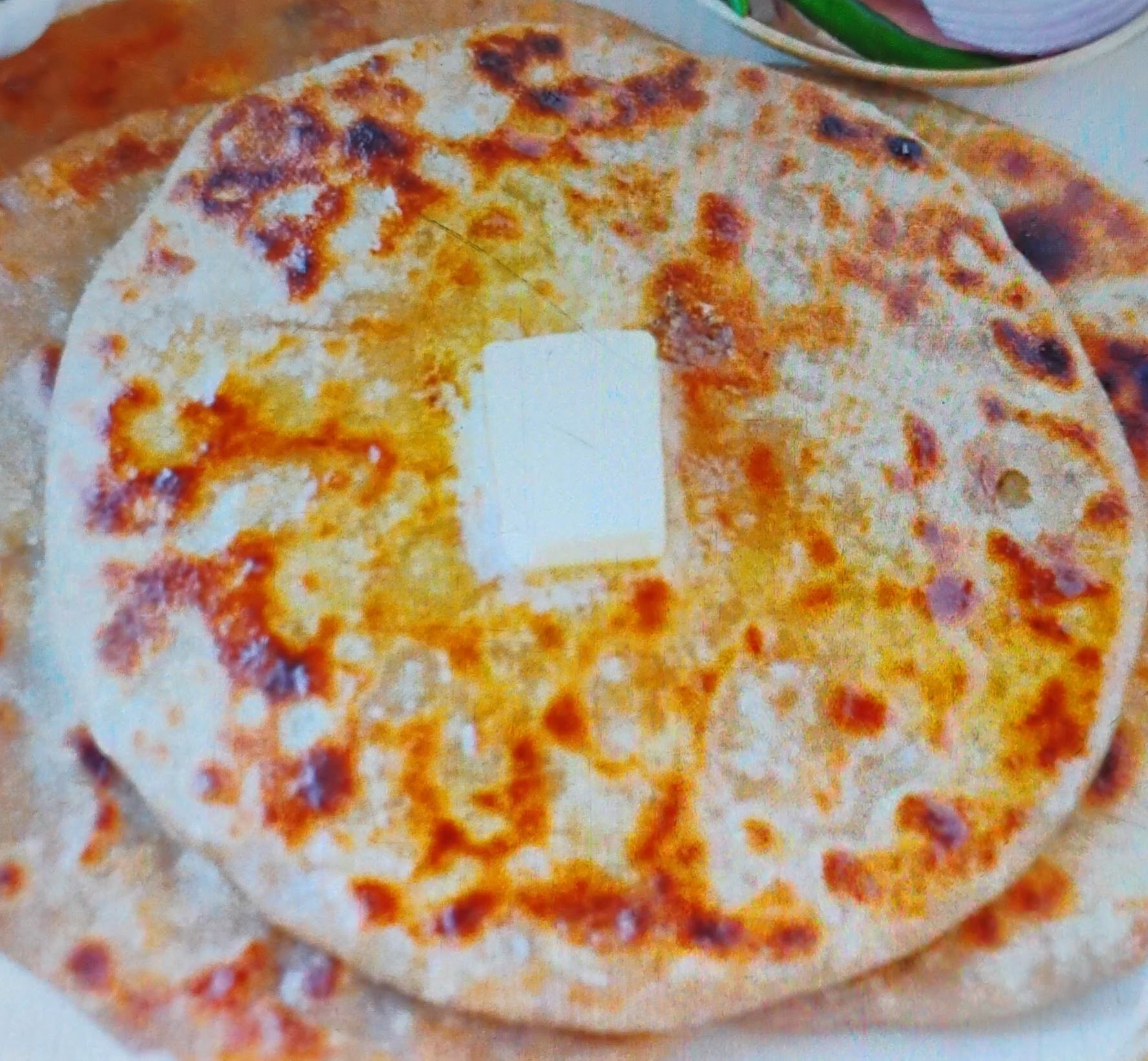 2 pyaz paratha heavy with pickle and green chutney